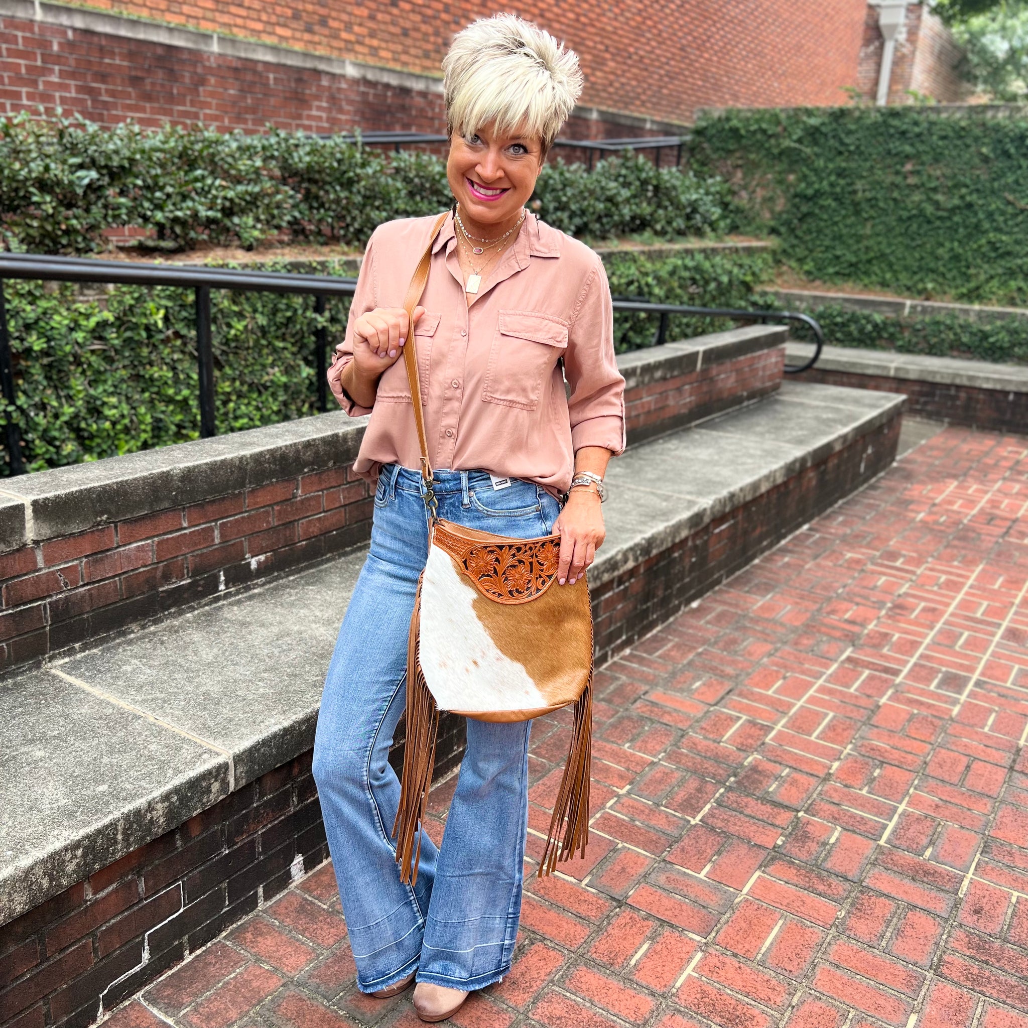 A Raw Umber Hand Tooled Bag
