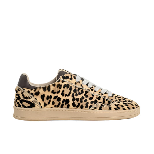 Sneaker with leopard print pattern on a white background